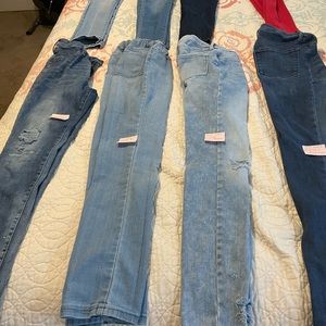 Girl blue jeans, jeggings, red stretchy jeggings